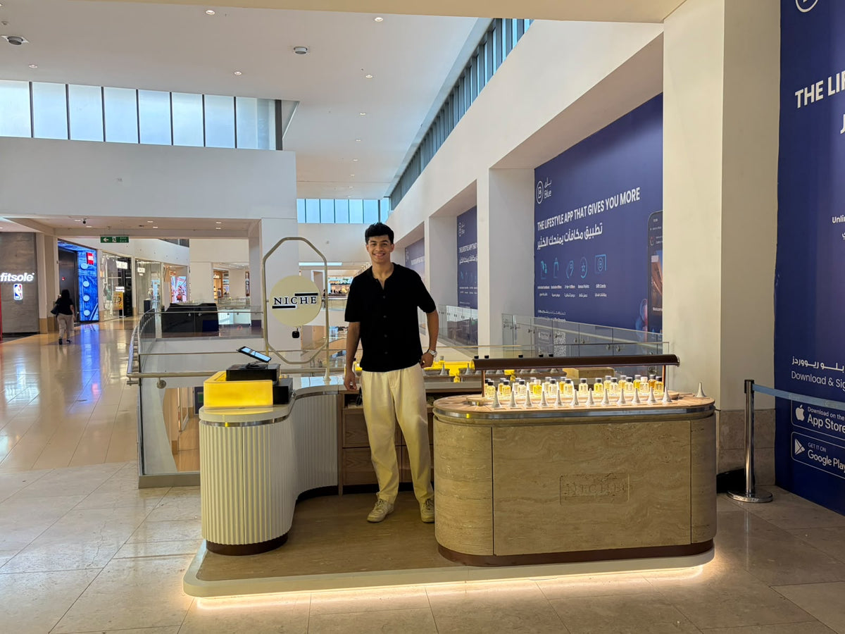 Niche Essences kiosk at Cairo Festival City Mall, now open with illuminated fragrance displays.